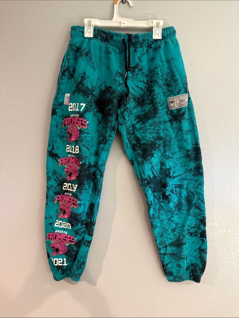 Teal Tie-Dye Track Joggers with Pink Graphic Accents